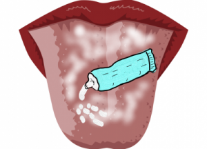 舌に歯磨き粉を付ける